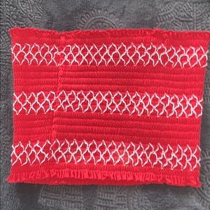 A red strapless tub top